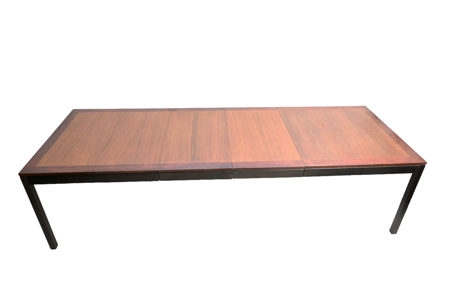 Jack Cartwright Dining Table: Jack Cartwright Dining Table. Founders Furniture. USA. 1960s. 2-20 inch leaves. Rosewood and walnut. Overall-111 1/2w x 40d x 29 1/2h, closed 71 1/2w x 40d x 29 1/2h. Provenance: The collection of Loi