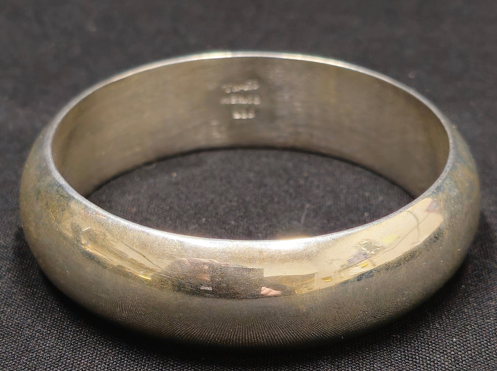 Sterling Silver Bangle Bracelet: Sterling Silver Bangle Bracelet. Marked TM 159 Mexico. 2 5/8 interior diameter.