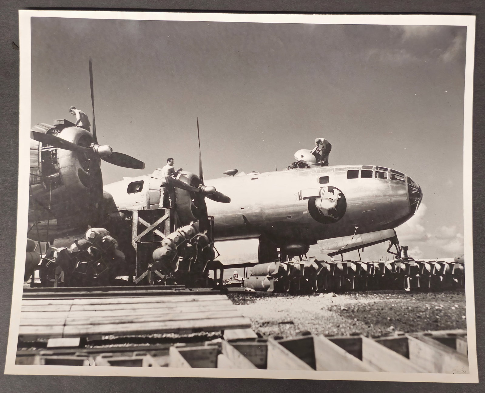World War II Photograph: A World War II Photograph of a plane being prepared for battle. 7 3/4" x 10"