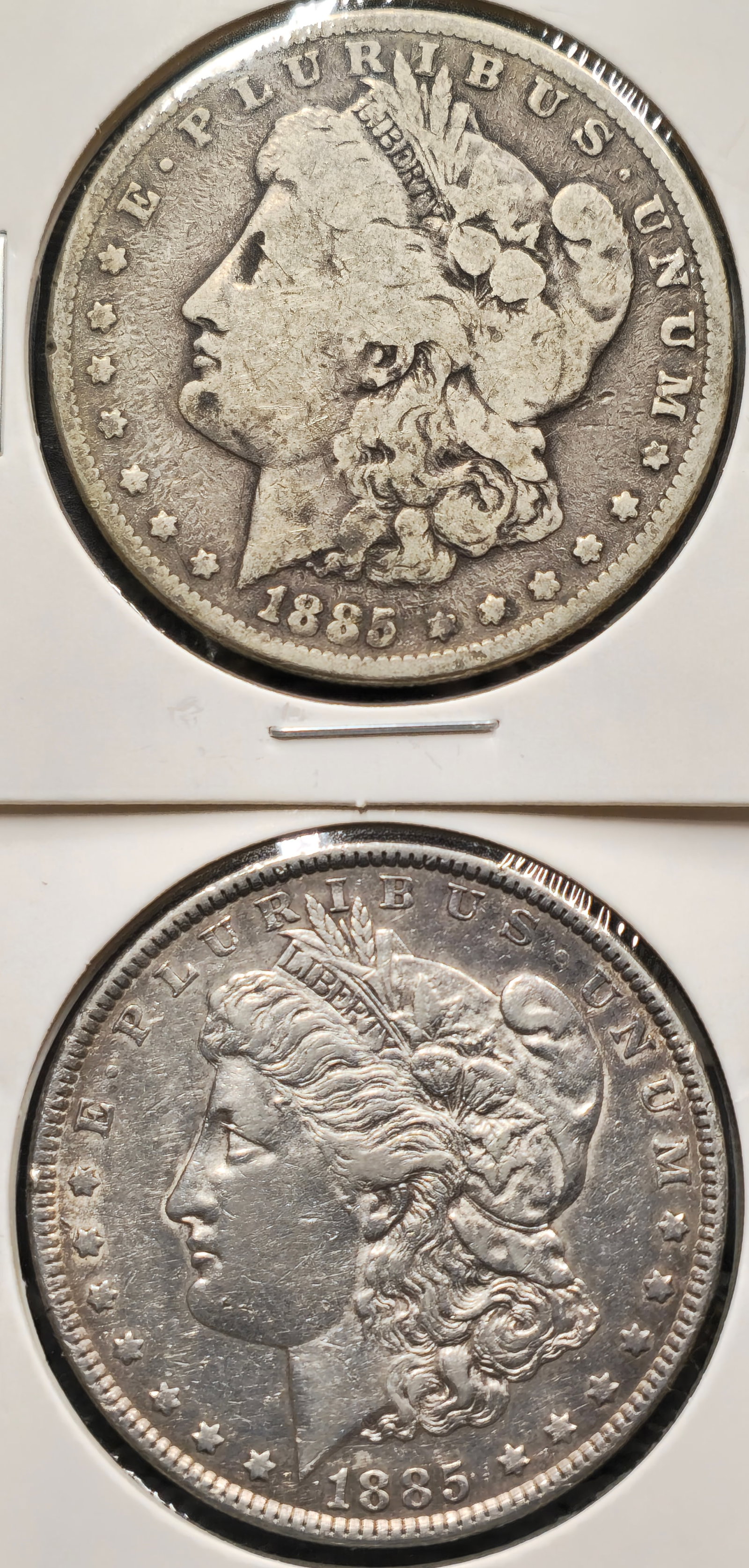 U.S. 1885 Morgan Silver Dollar Coins: (2) U.S. coins total both 1885 Morgan $1 silver dollars.