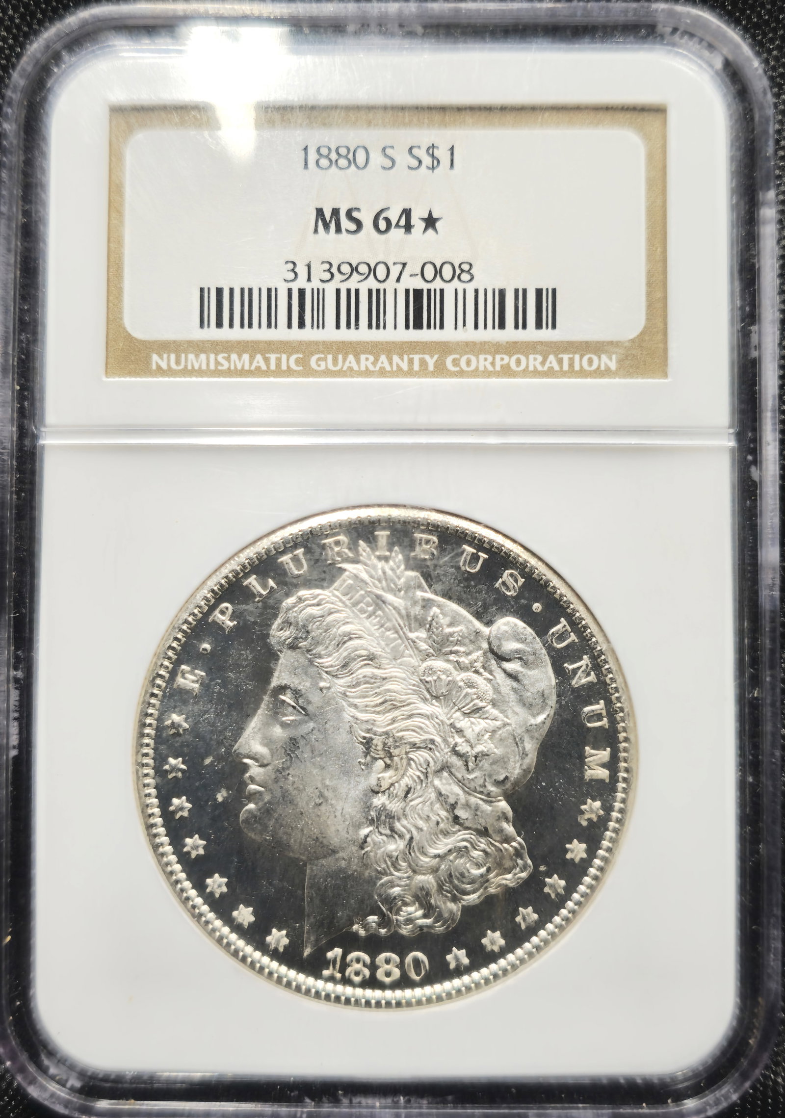 1880-S Morgan Silver Dollar Coin MS 64* NGC: U.S. 1880-S Morgan $1 silver dollar graded MS 64 * by NGC.