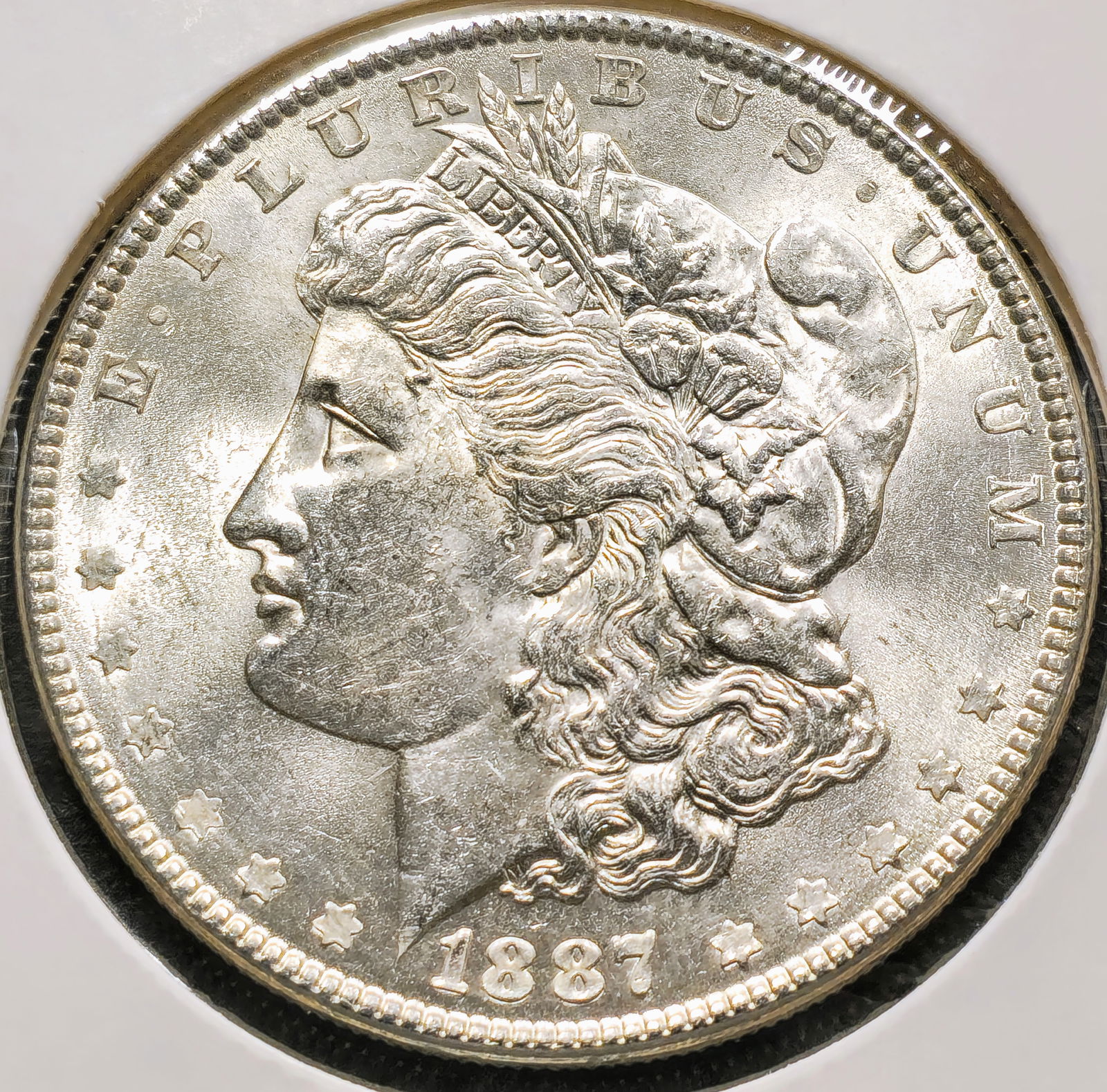 1887 Morgan Silver Dollar Coin Uncirculated (1 of 2)