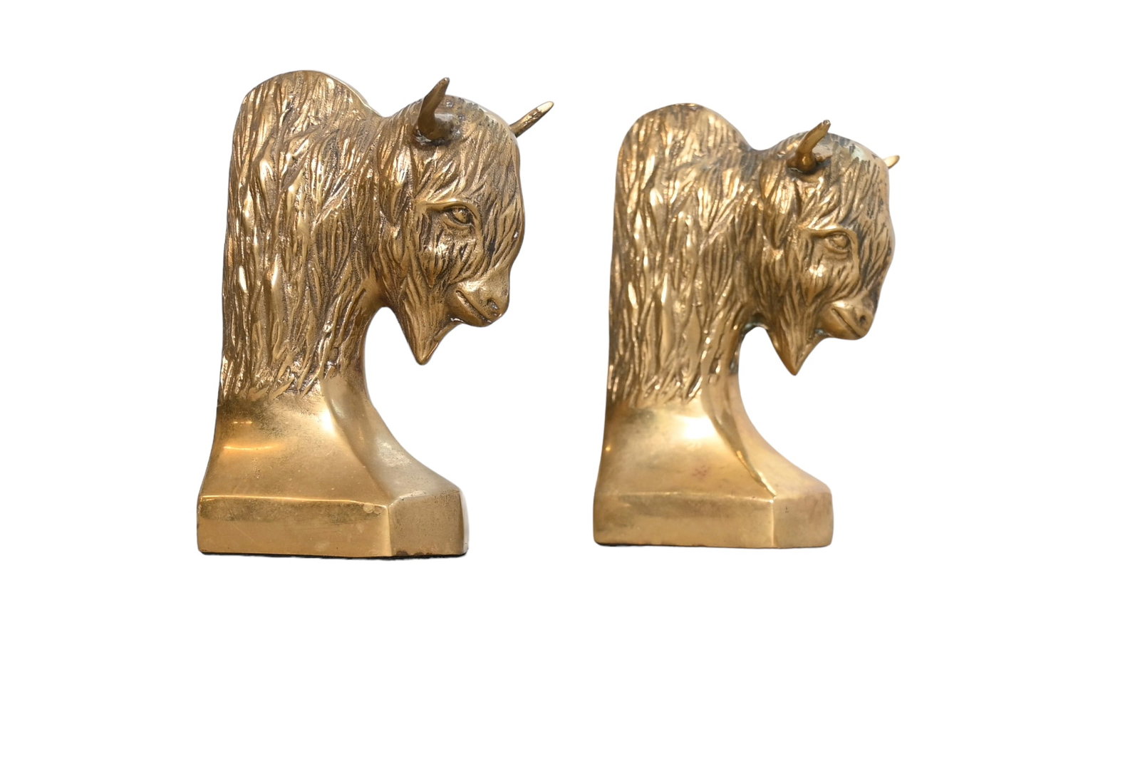 Brass Buffalo Head Bookends: Brass Buffalo Head Bookends. 1970. 2 5/8w x 3 1/2d x 5 3/4h.