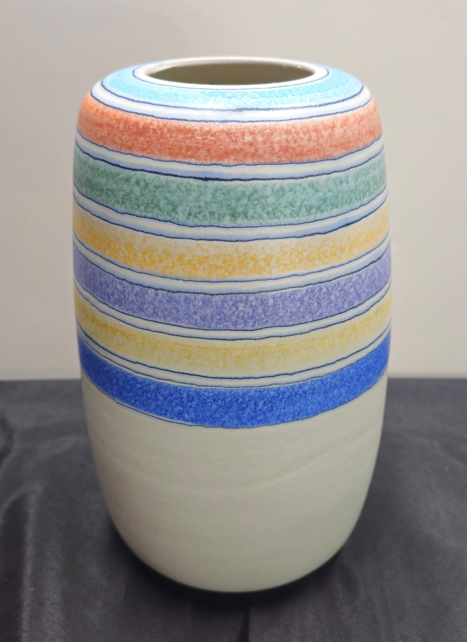 Large Alvino Bagni Pottery Vase for Raymor: Large pottery vase by Alvino Bagni for Raymor, Italy. 1960’s. Decorated with pastel colored stripes with original Raymor label to underside. 6 1/2"dia x 12 1/4"h