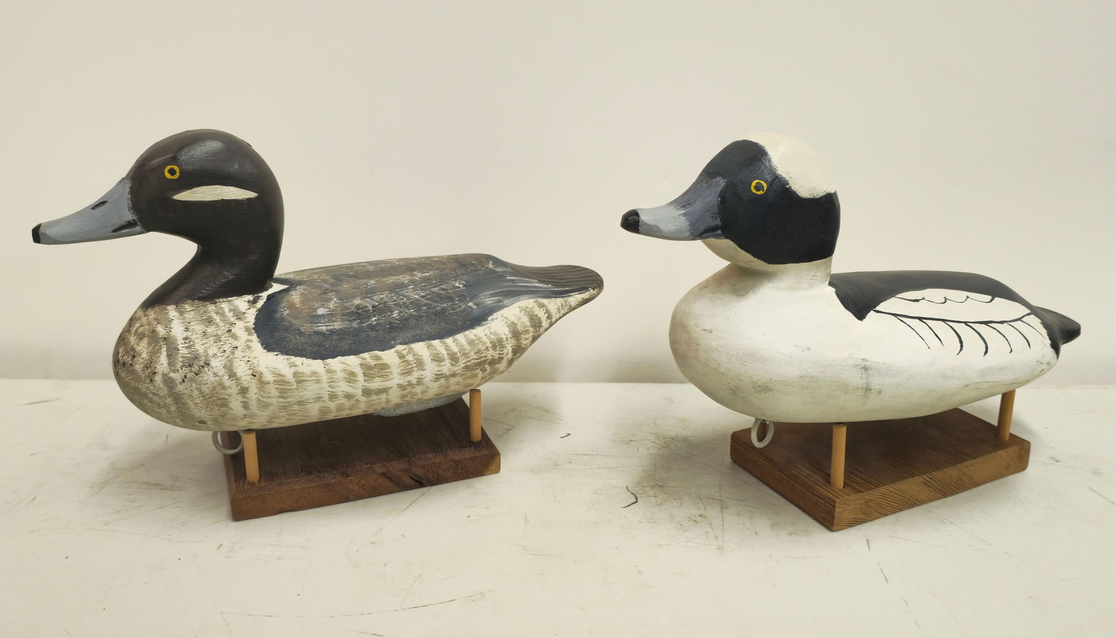 Pair of J. Evans McKinney Decoys (Elkton, Maryland): Pair of decoys by J. Evans McKinney, Elkton, Maryland. Both marked to bottom J. Evans McKinney, Elkton, Maryland 1988. 11 1/2" Long