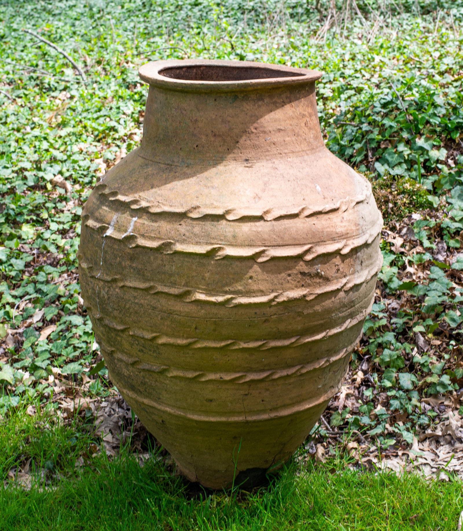 Italian Terracotta Olive Pot: Italian Terracotta Olive Pot, 20th century. High relief braided design. Provenance; The Beth & J. Karp Collection, Indian Hill, Ohio.