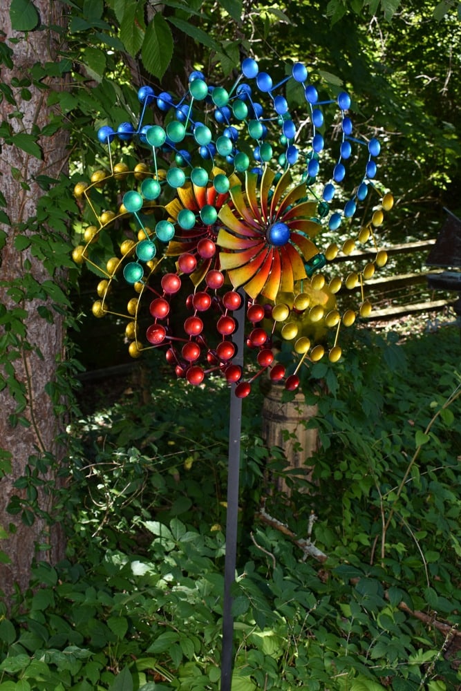 Rainbow Pinwheel Wind Sculpture: Rainbow Pinwheel Wind Sculpture. Dual motion rotors. 24w x 12d x 72h.