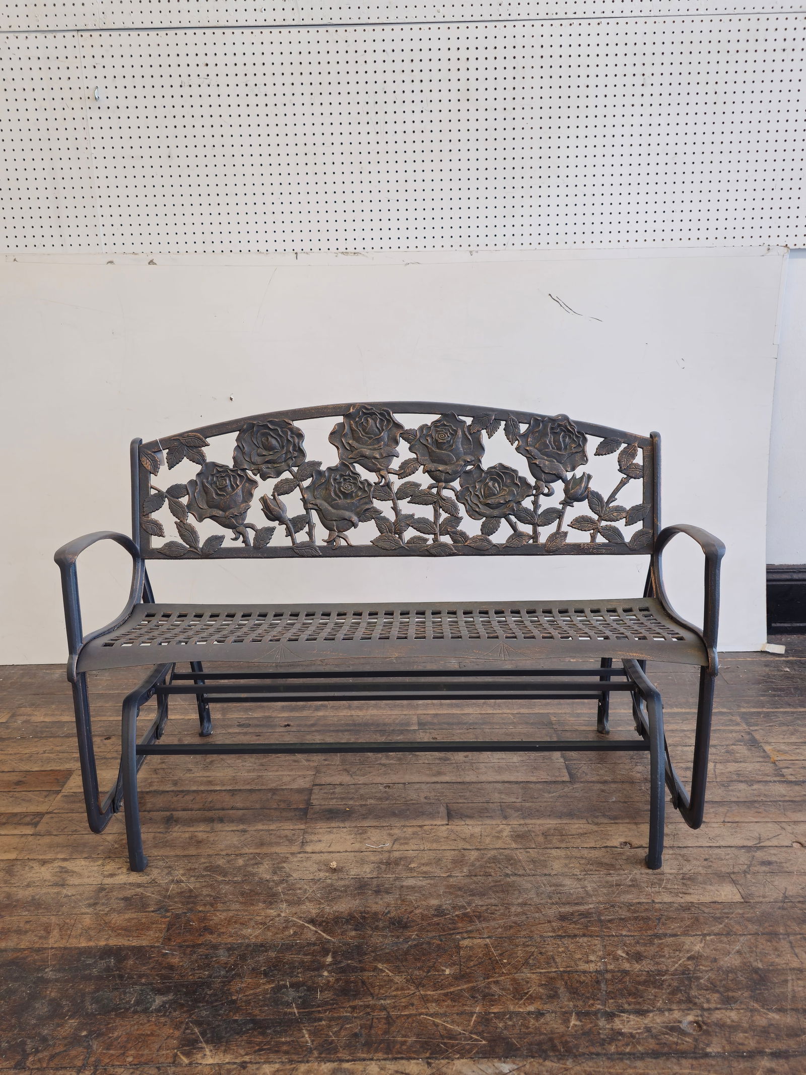 Angileh Iron Garden Glider: Angileh Iron Garden Glider. Wonderful embossed floral back. Smooth, quite and comfortable. 50w x 25d x 32 1/2h. SH - 17 1/2h.