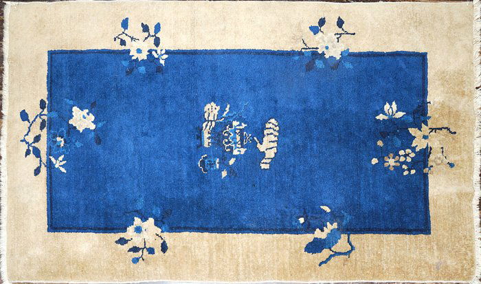 Peking Chinese Rug - 3' 2" x 4' 6": Blue field and camel border, circa 1910. Size: 38" x 54"