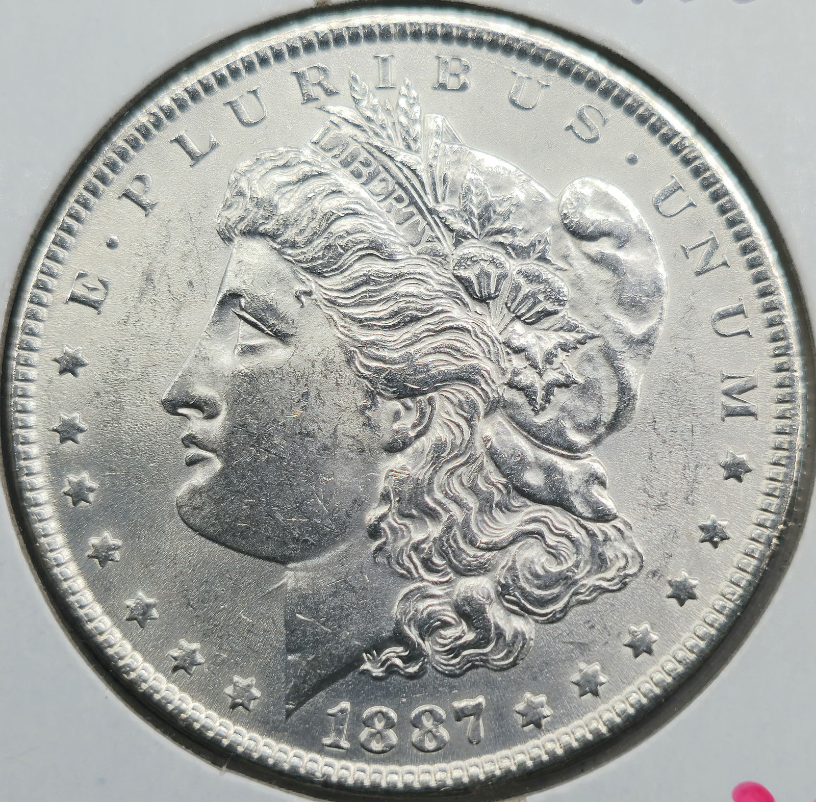 1887 Morgan Silver Dollar Coin Uncirculated (1 of 2)