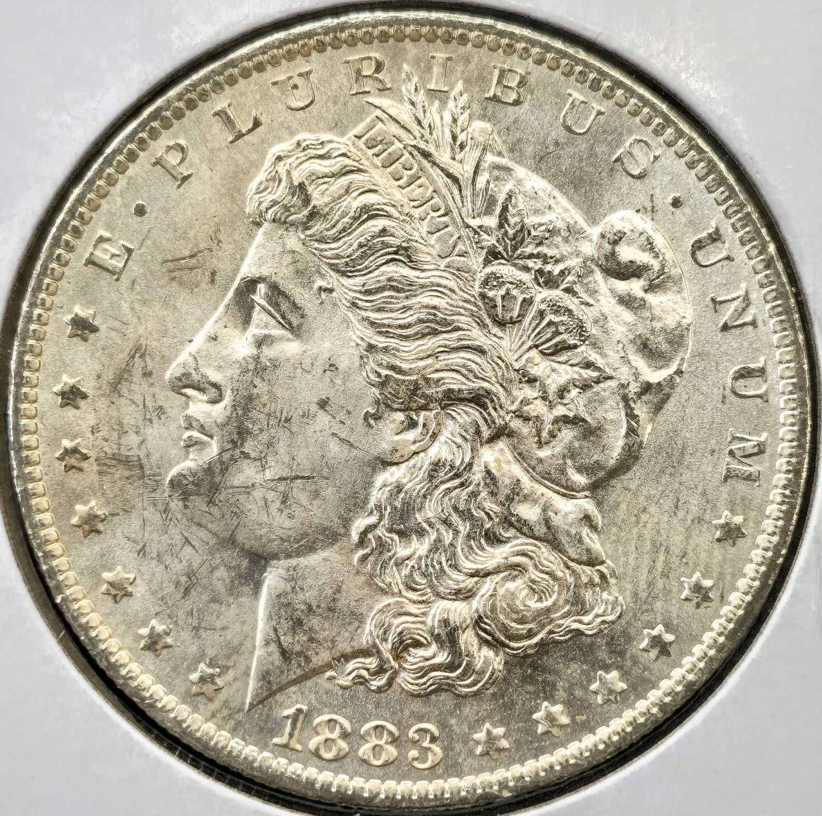 1883-O Morgan  Dollar Coin Uncirculated (1 of 2)