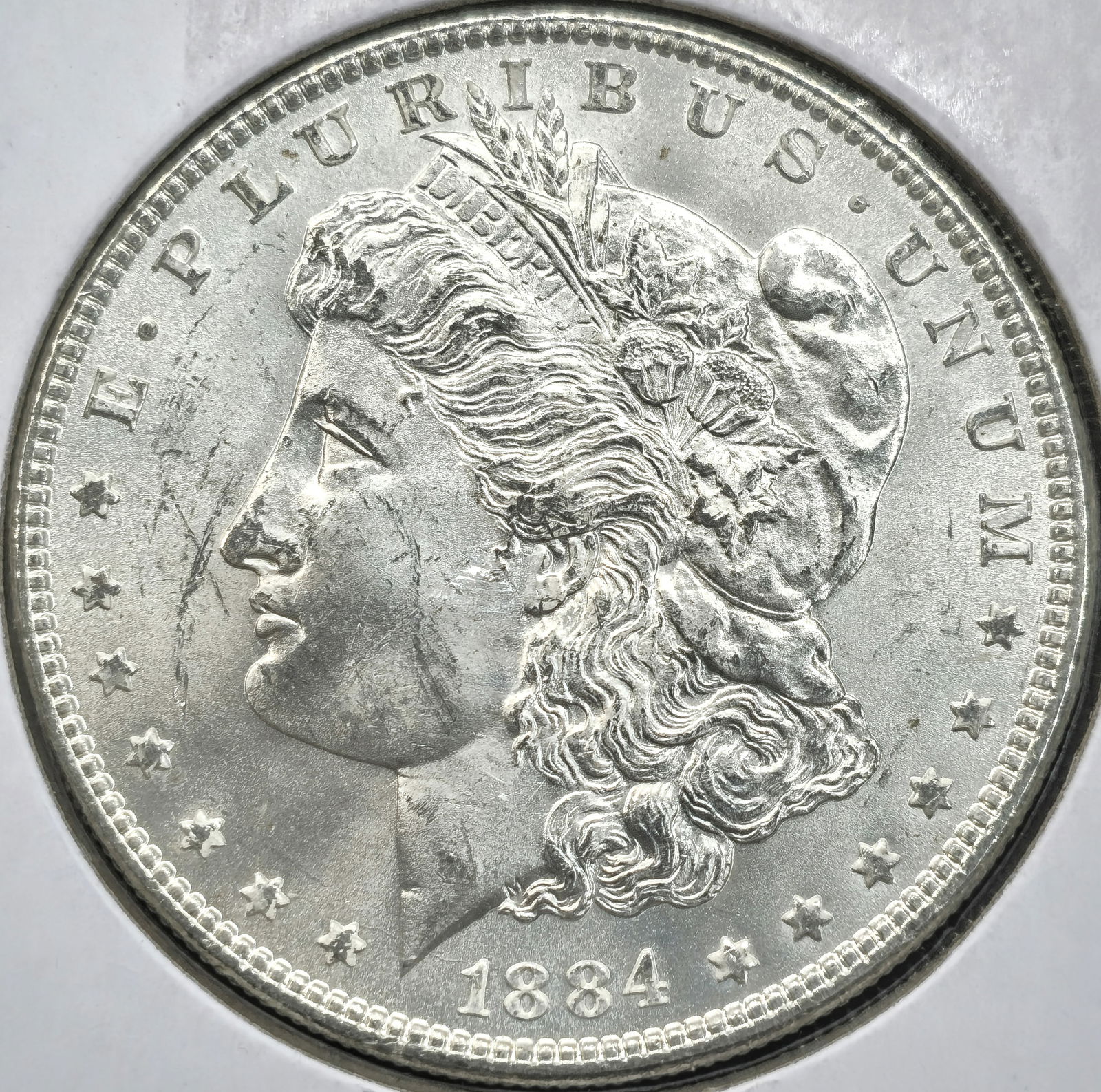1884 Morgan Dollar Coin Uncirculated (1 of 2)