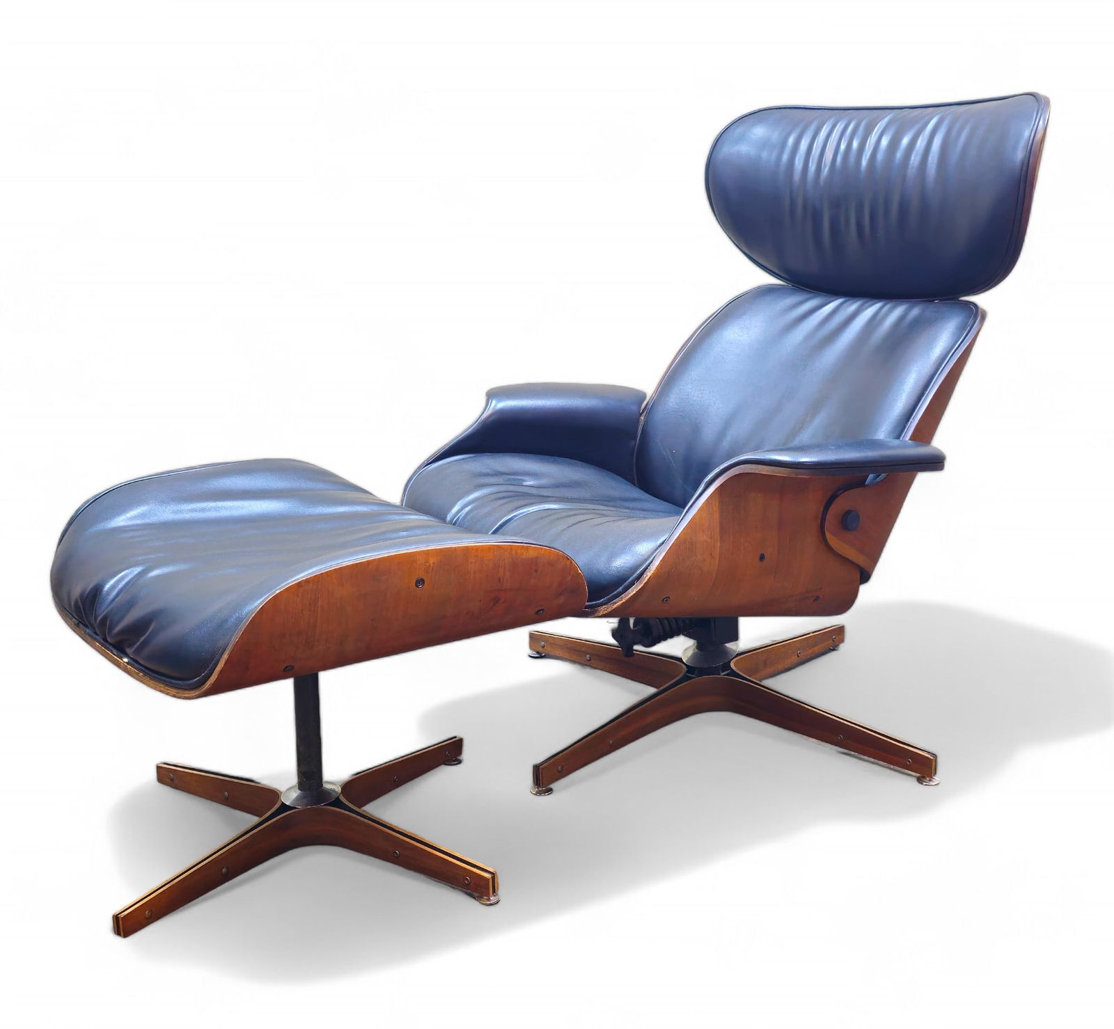 George Mulhauser "Mr. Chair" Lounge Chair & Ottoman: George Mulhauser "Mr. Chair" Lounge Chair & Ottoman. Plycraft Inc. USA. 1960. Original Mahogony and walnut plywood, brass plated steel. Chair - 32w x 21d x 41 1/2h, SH-18. Ottoman - 24 1/2w x 21d x 18