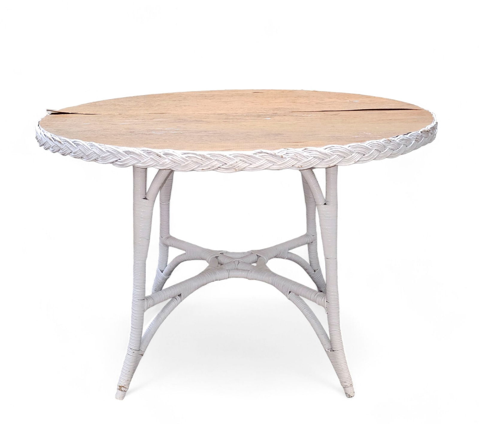 Antique Wicker Dining Table: Round oak top with woven wicker border. Table has wicker legs with "X" stretcher. Circa 1920's. 42 dia x 29h.