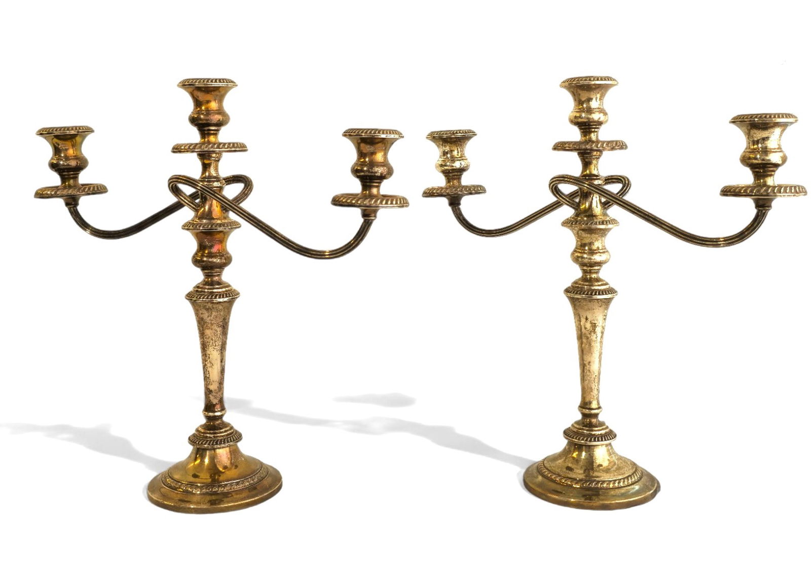 Gorham Sterling "Cambridge" Candelabras #1771: Pair of 3 branch candelabras. Sterling silver. Fluted shaped arms, turned shaft over a round footed base. Gadroon borders. 2 pieces for easy shipping. Manufacturer's mark to underside and sterling. 15