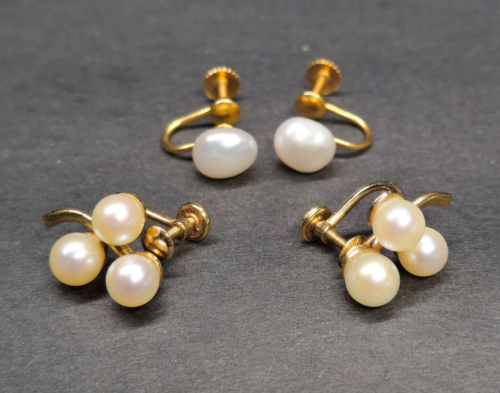 14k Gold, Pearl and Van Dell 12k GF Pearl Earrings: (2) Sets of pearl earrings, (1) marked 14k and (1) marked 12k gf Van Dell. Total weight of 14k earrings- 3.3 grams.