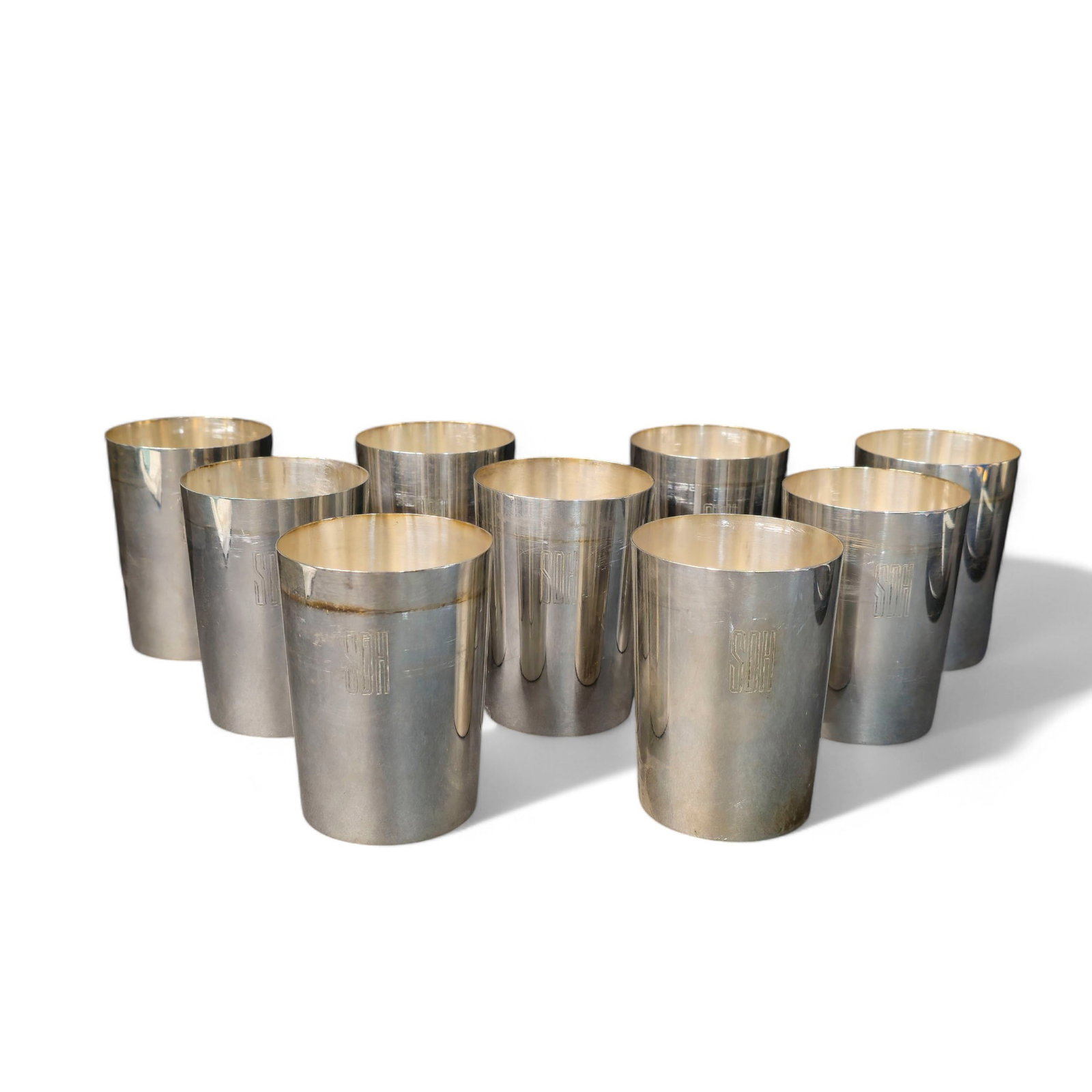 Frank Herschede Co. Seamless Mint Julep Cups: Set of (9) Mint Julep cups by Frank Herschede Co. All monogrammed "SDH" to side. Marked to bottom "Frank Herschede Co. Seamless 01". 3"dia x 4"h