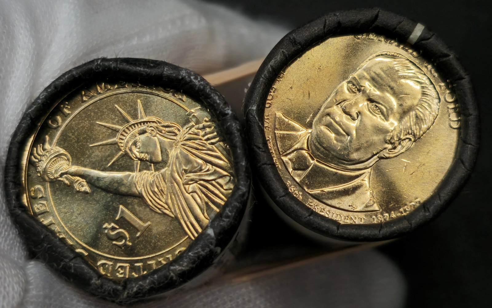 Presidential Dollar U.S. Mint Rolls: (2) U.S. Mint rolls total. (1) Gerland R. Ford and (1) Woodrow Wilson Dollar $25 rolls. In original U.S. Mint roll.