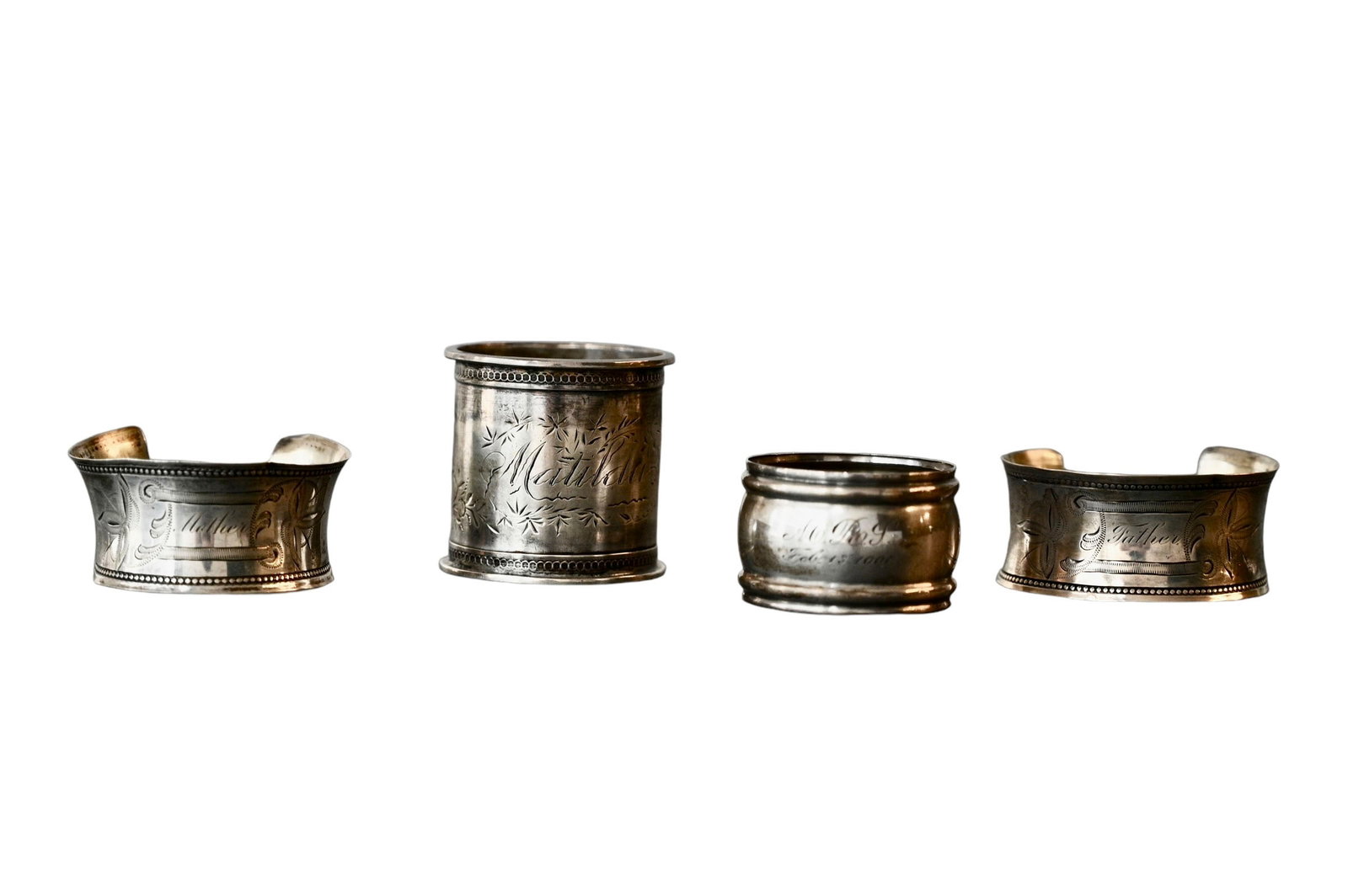 Assembled Sterling Silver Napkin Rings: Assembled Sterling Silver Napkin Rings, 4 total. 1 3/4 dia x 1 3/4h. Weight - 1.945 ozt.