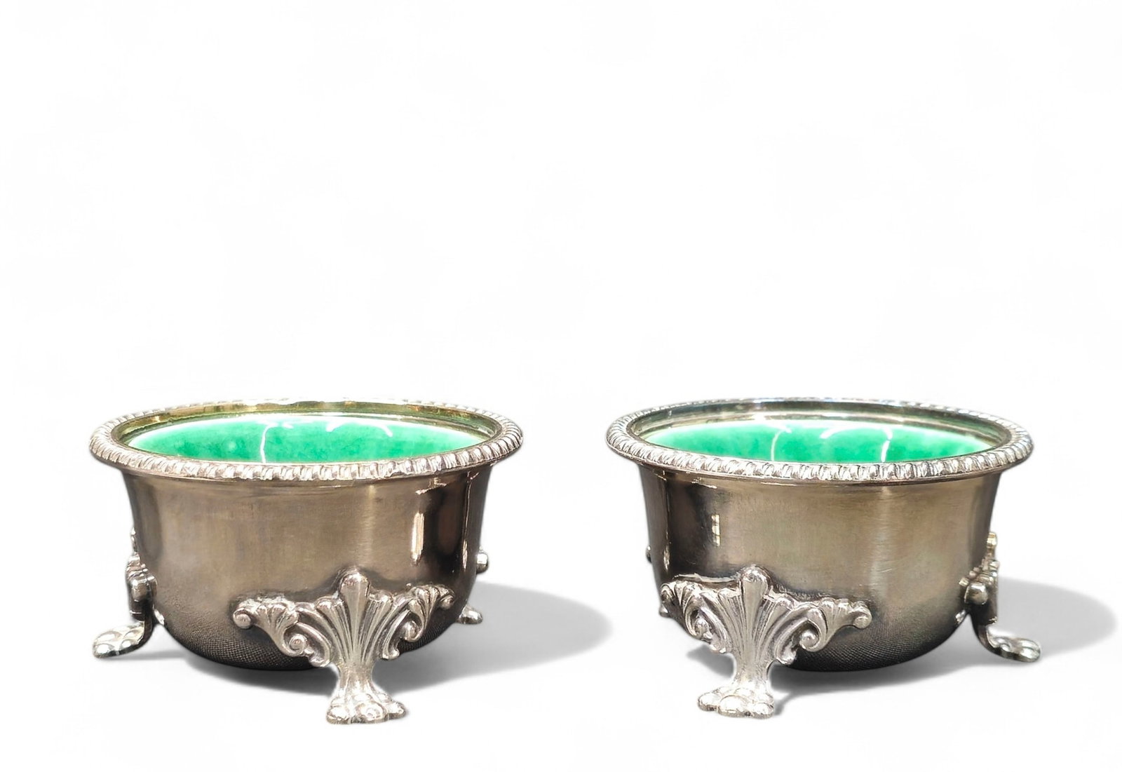 Exeter Sheffield Paw Foot Master Salts: Master salts, pair. Original green porcelain liner. Beaded border and paw feet. 2 3/4 dia x 2 1/2h.