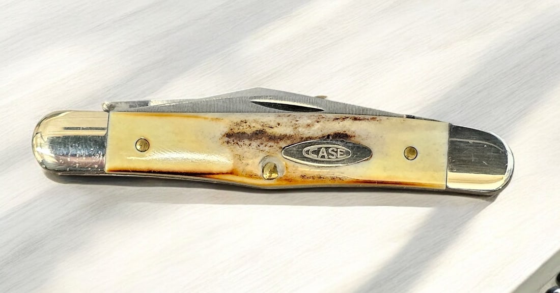 1980 Case 75th Anniversary Stag Knife #5208 SSP: 1980 Case 75th Anniversary Stag Knife #5208 SSP. Stainless blades with stag handle. Original "wrapping" paper. Open: 5 1/2", closed: 3 1/2".