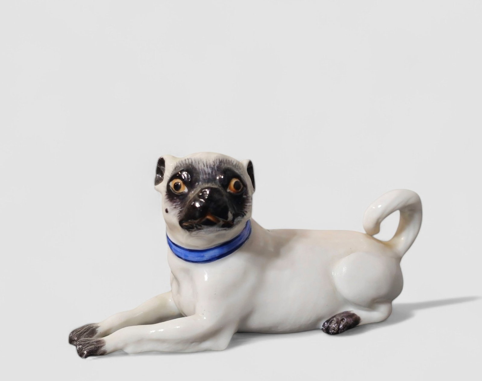 Crossed Sword Meissen Porcelain Pug Figurine: Crossed Sword Meissen Porcelain Pug Figurine, Germany. Bears crossed swords and #2836 to underside. 3w x 2d x 2 1/2h