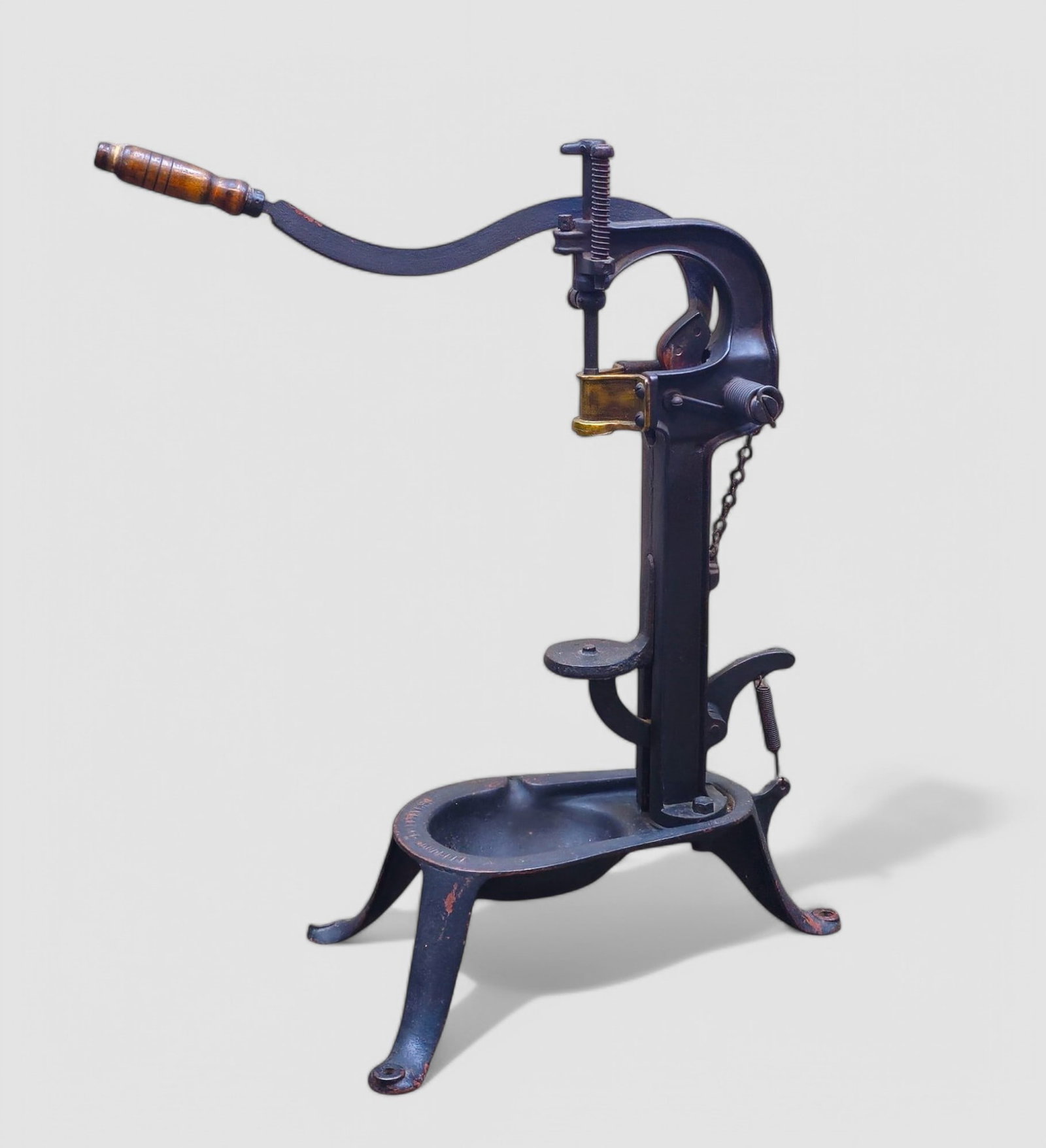 Antique French Cast Iron Wine Bottle Corker: Circa 1890, LA MEILLEUAE B and B.F. Paris. The overflow bowl has printed "E Chauder LES Bouchons" turned wood handle. 23 3/4w x 14 1/4d x 45 3/8h.