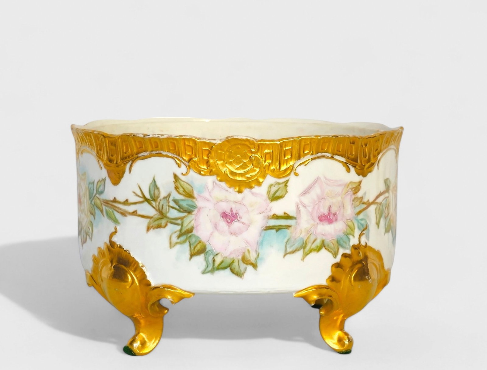 French Footed Gilt & Rose Porcelain Planter/ Fernery: French Footed Gilt & Rose Porcelain Planter/ Fernery, circa 1900. Gilt borders and feet. Pink rose pattern. Manufacturer's marks to underside. Original liner. 9dia x 5 1/2h