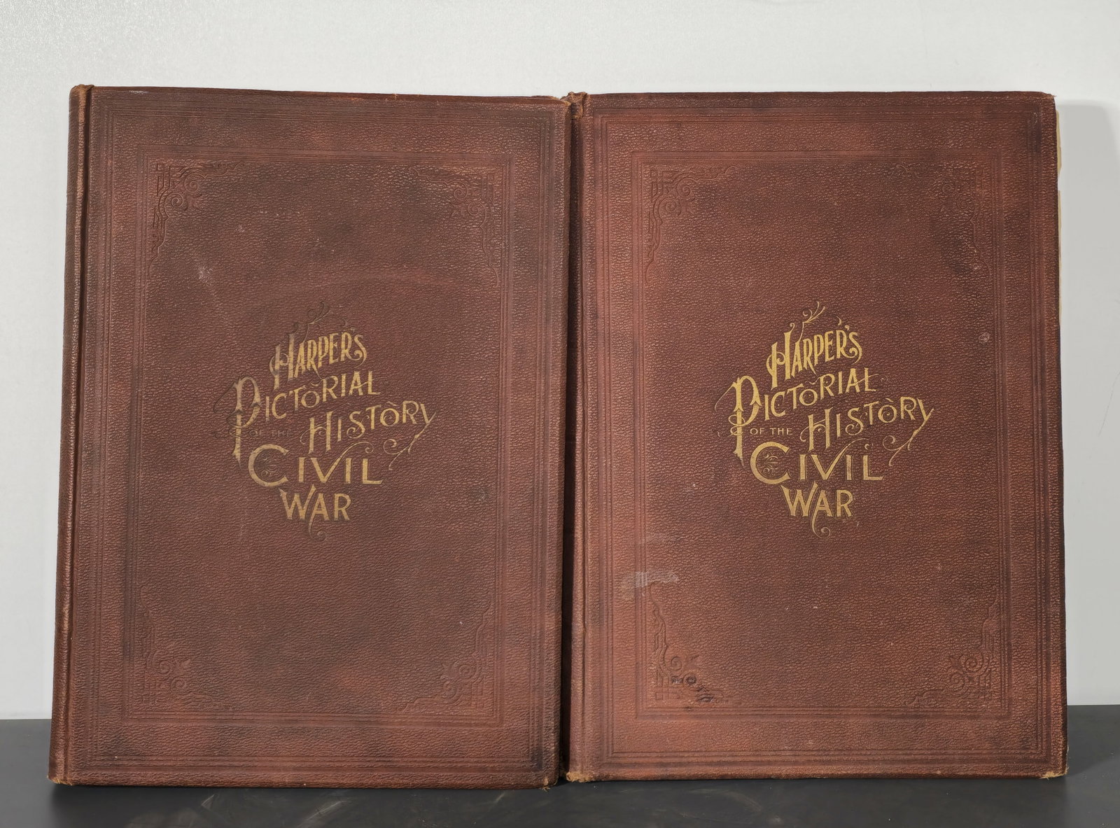 Harper's Pictorial History of Civil War: Alfred H. Guernsey and Henry M. Alden Harper's Pictorial History of the Civil War. Part first and Part second (New York: McDonnell Bros., 1866) Elephant folio. First Edition. Red leather boards with g