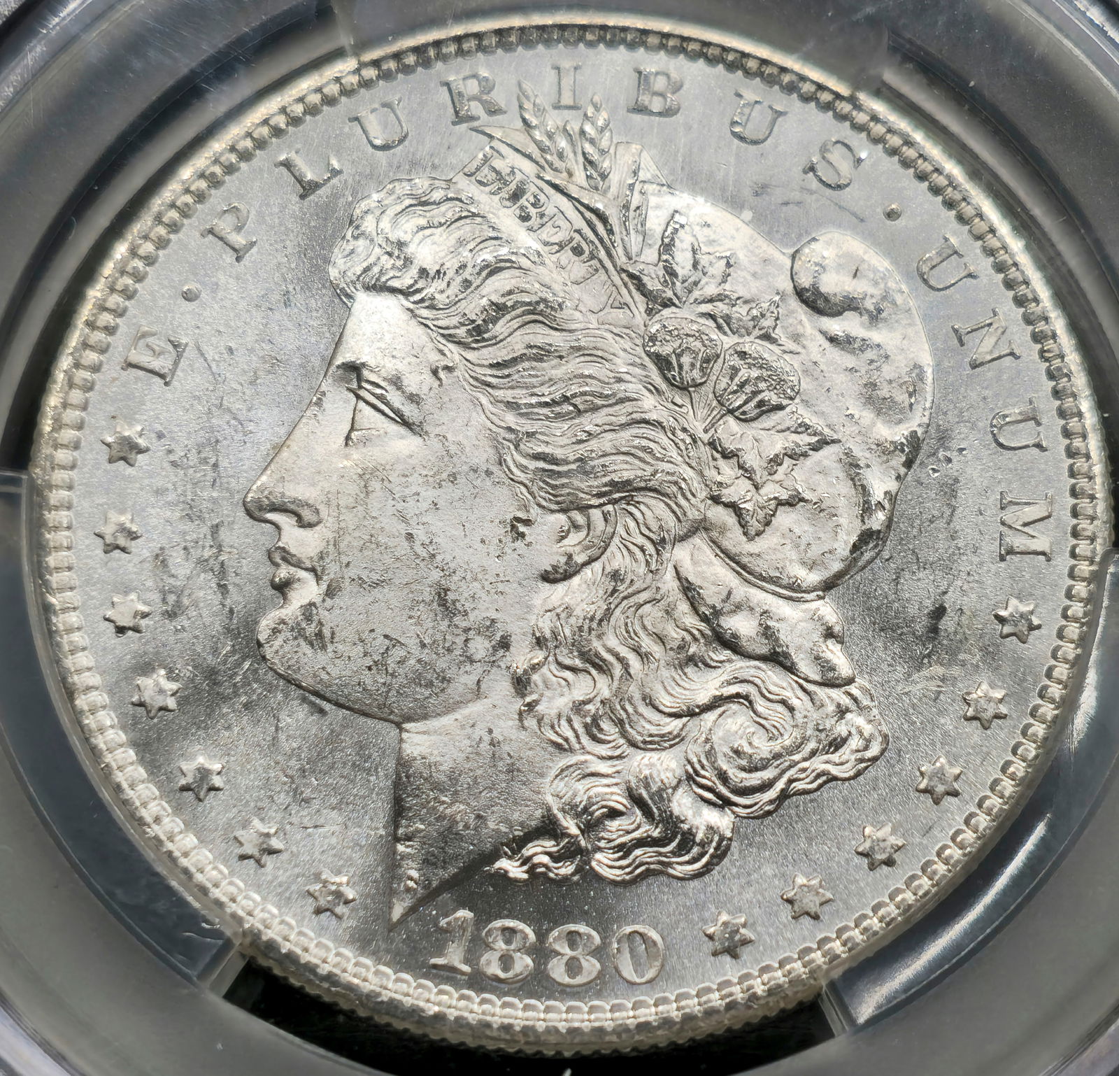 1880-S Morgan Silver Dollar MS 62 CAC (1 of 4)