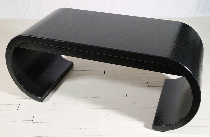 Karl Springer: Black lacquer over wood, two drawer desk, curved waterfall sides. Private collection. Size 71L x 40D x 29.75H