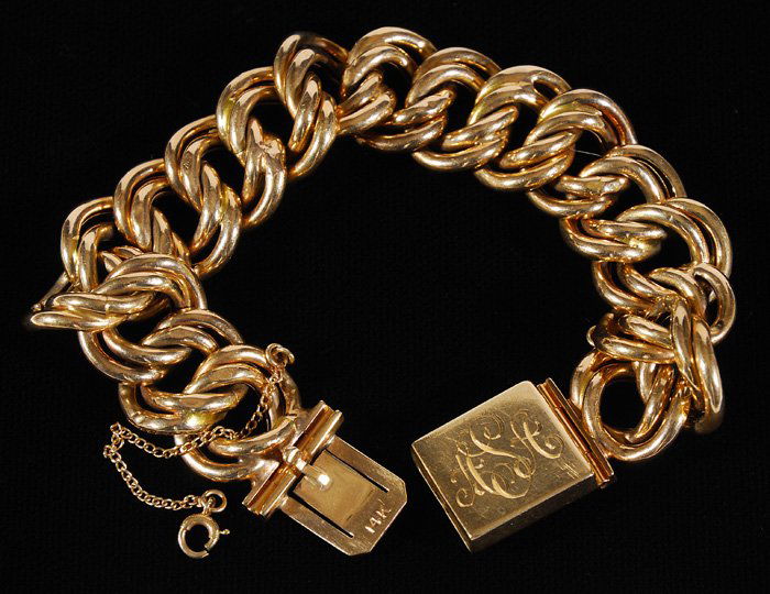14kt Yellow Gold Bracelet: Double curb, machine and assembled bracelet, monogram on box clasp. Approx. 18dwt. Stamped 14kt, yellow gold. Estate of Dr. Maurice Marsh