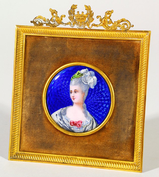French Enamel: Enamel portrait of Madame de Pompadour with blue, engine turned background, finely detailed. In original ornate brass frame with kick-stand back. Blue beehive mark.