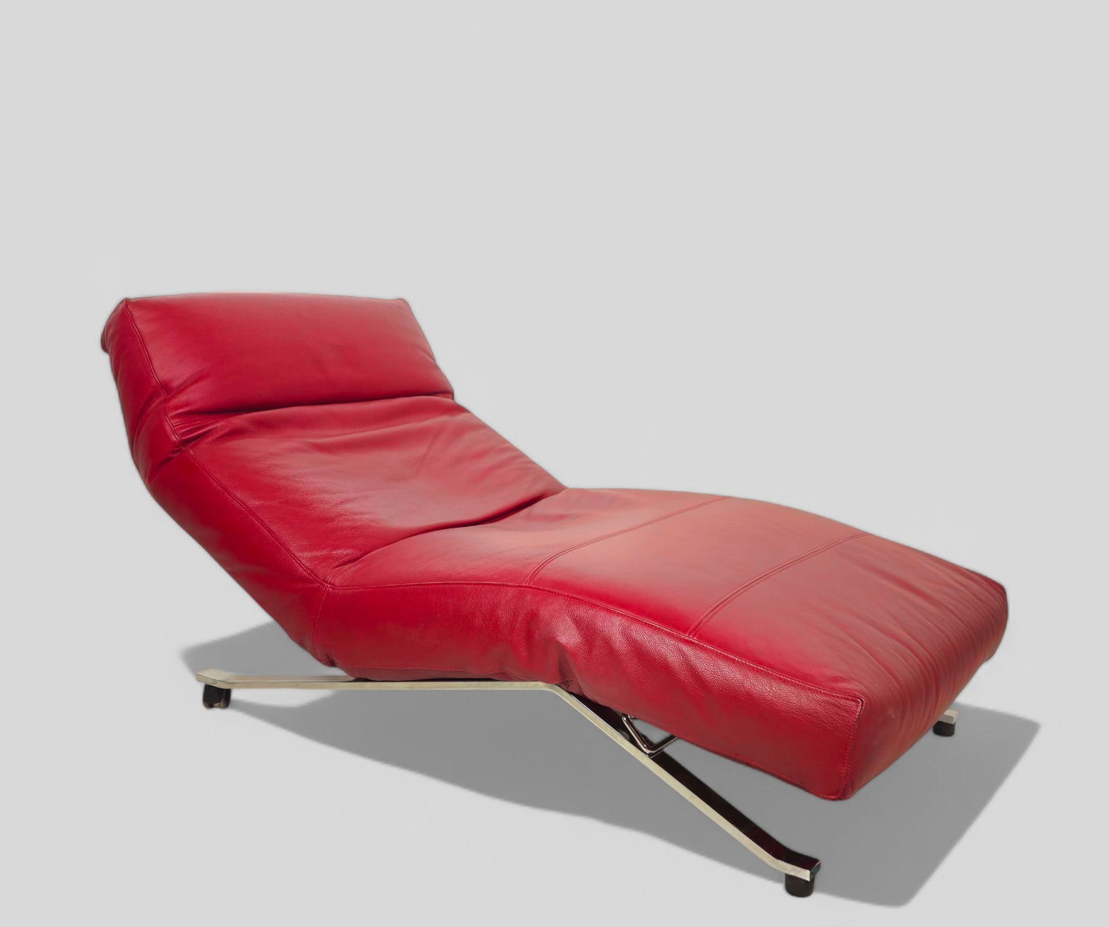Eilersen Control Recliner: Eilersen Control Recliner, Denmark, 2020. Red leather, chrome plated steel and plastic. 34w x 85d x 39h Sh- 16