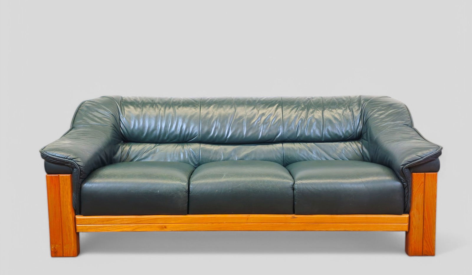 Duncker and Louw Leather & Teak Sofa: Duncker and Louw Leather & Teak Sofa, 1980's. Leather and teak. 81w x 38d x 31h SH- 16