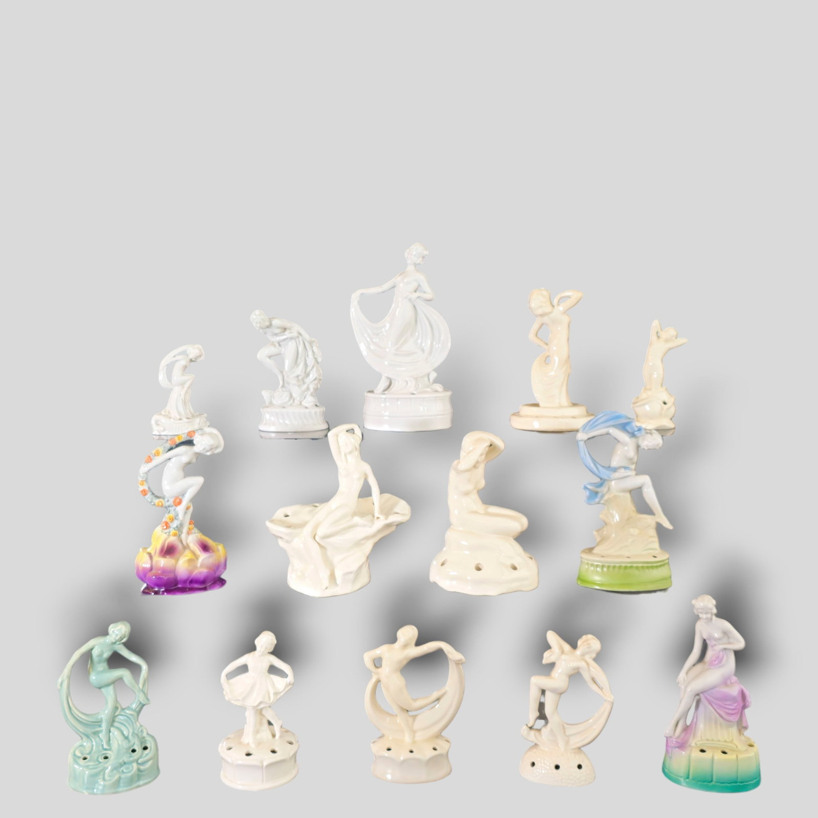 Assembled Art Deco Flower Frogs: Assembled Art Deco Flower Frogs, (15) total. (3) are German. (12) are nude. (1) is girl in dress. (1) is lady in lingerie. Outstanding group of figurines. Tallest- 5w x 3d x 9 1/4h Smallest- 3w x 2d x