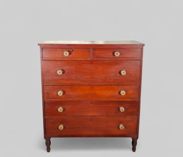 19th Century Sheraton Graduated Chest/ Dresser: 19th Century Sheraton Graduated Chest/ Dresser, circa 1820. Cherry. Two over four drawers. Original glass knobs. Chest rest on turned legs. Dovetailed drawers and three board back. 43 1/4w x 20d x 50h