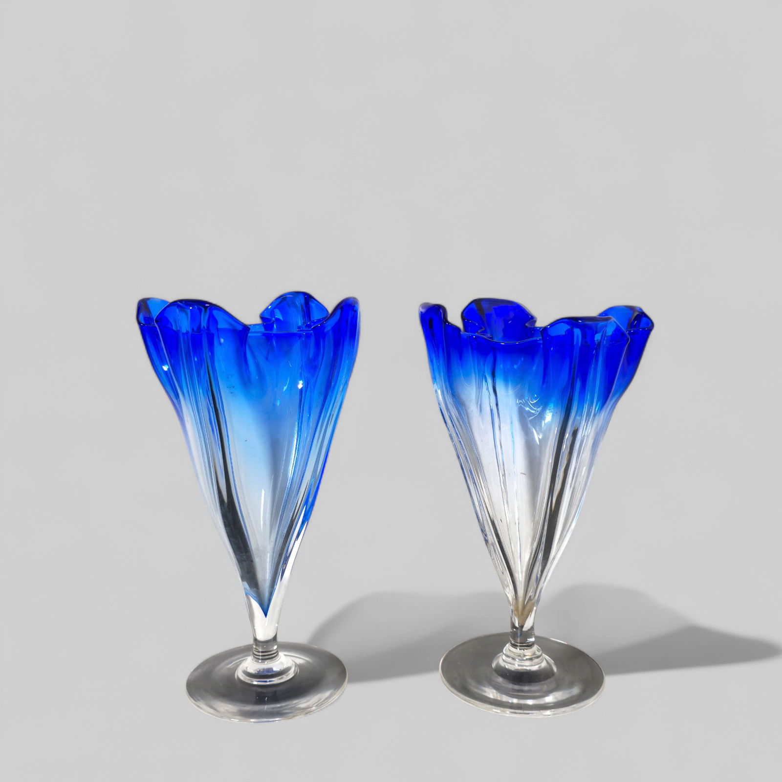 Steuben Grotesque Art Glass Vases, #7490: Steuben Grotesque Art Glass Vases, #7490, pair. Circa 1920-1930. Designed attributed to Frederick Carder. 5 5/8w x 5 1/2 d x 9 1/2h