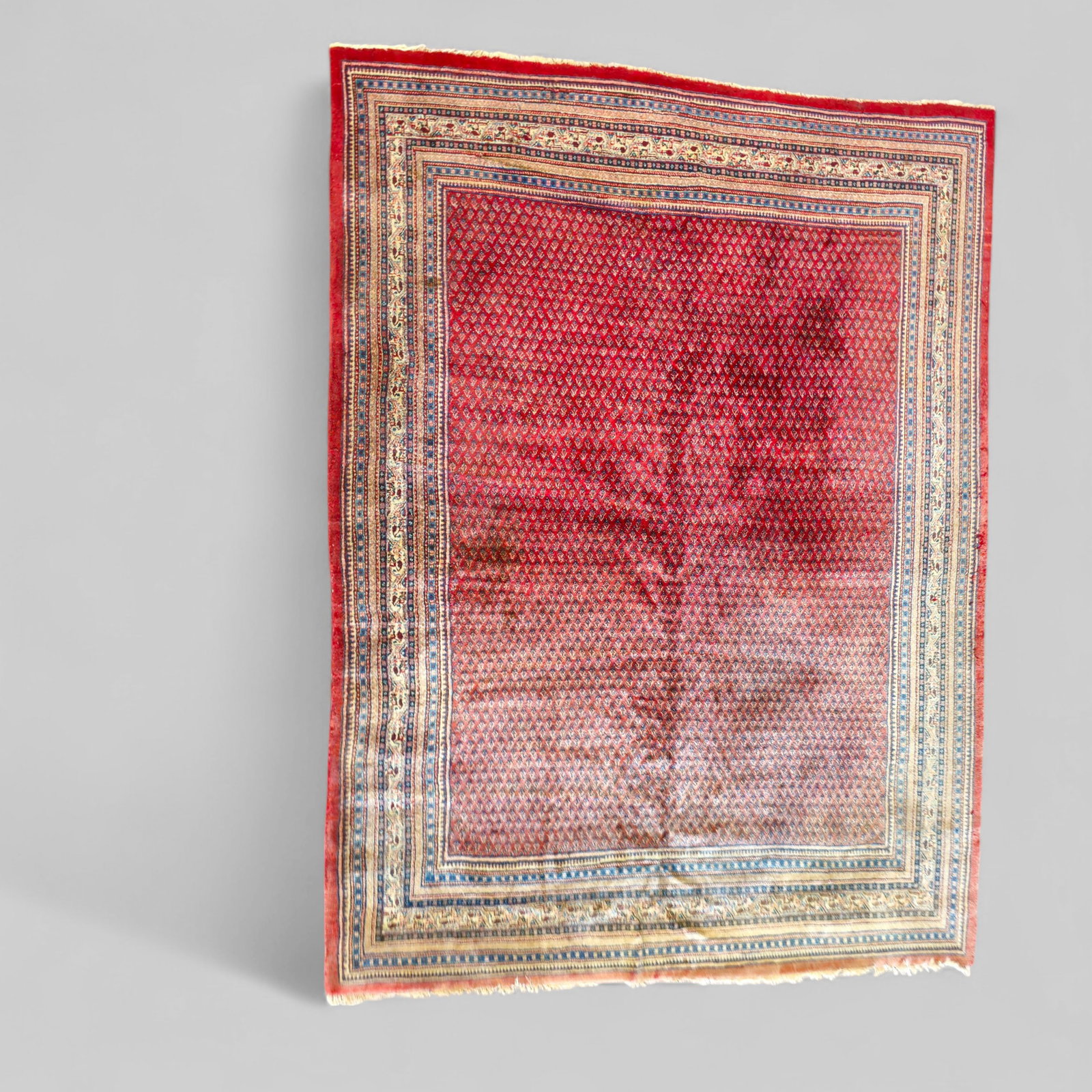 Royal Hamadan Carpet: 20th century. All over fish tail design over a red field. Multiple layer border. 9' 2 1/2" x 12'
