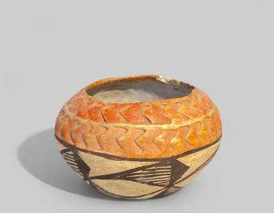Acoma Pueblo Native American Pottery Olla: Early 20th century Acoma Pueblo polychrome Olla, New Mexico. Hand painted orange and brown with geometric design and undulating edge. 3 1/2dia x 2 1/8h