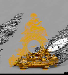 French Louis XVI Style Gilt Bronze Cherub Mantel Clock: French Louis XVI Style Gilt Bronze Cherub Mantel Clock, circa 1860. Japy Freres Movement. Two romantic cherubs raised on dome top. White porcelain face with roman numerals. Face is flanked by tow scro