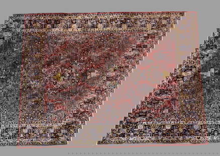 Sarouk Area Rug: Sarouk Area Rug. Circa 1930s. All over garden design over a red field. Art deco flowering urn design. Multiple blue layer borders. 10' x 13' 1".