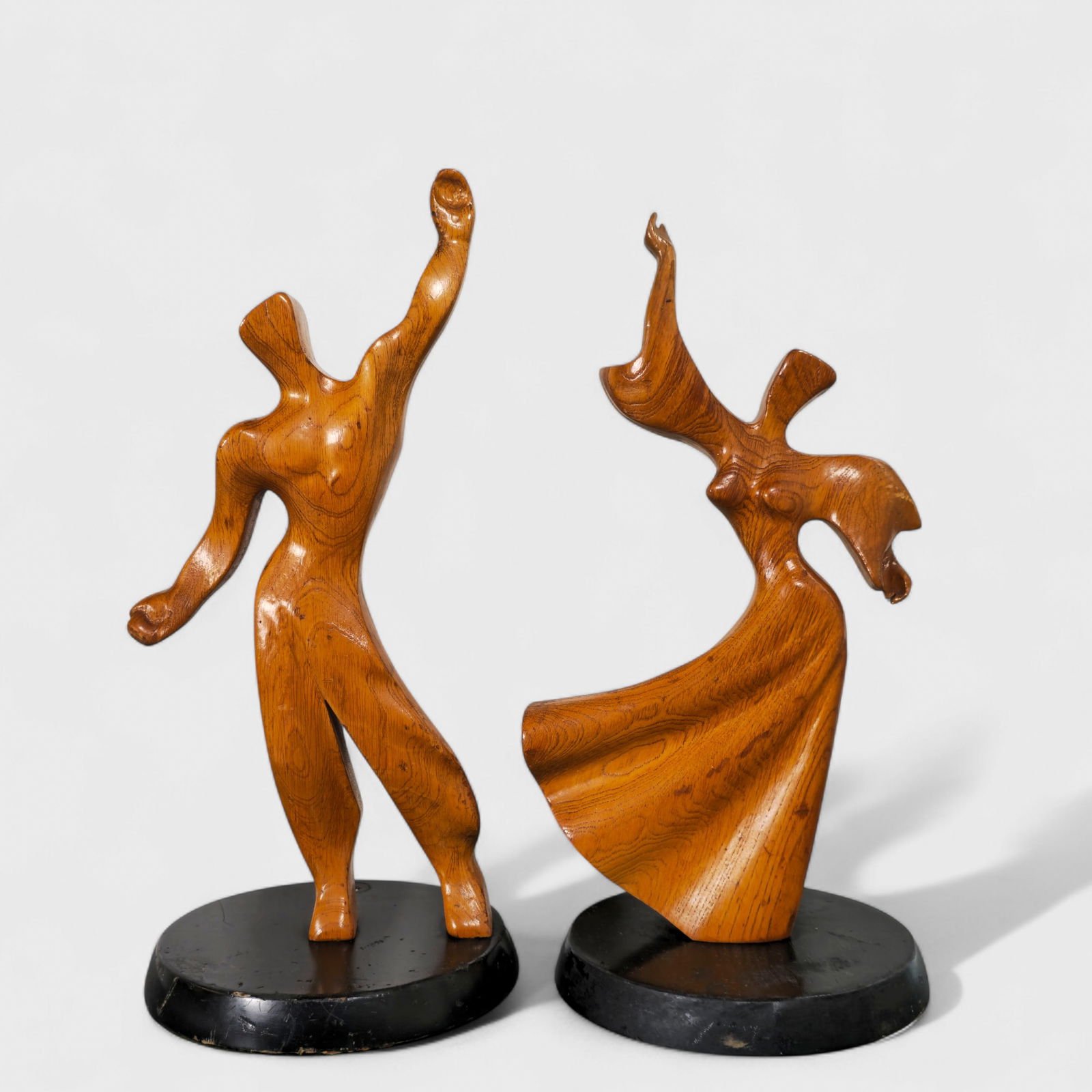 Heifetz Attribution MCM Dancer Sculptures: Heifetz Attribution MCM Dancer Sculptures, USA, 1950. Ebonized wood and oak. 8 1/2dia x 19 1/2h