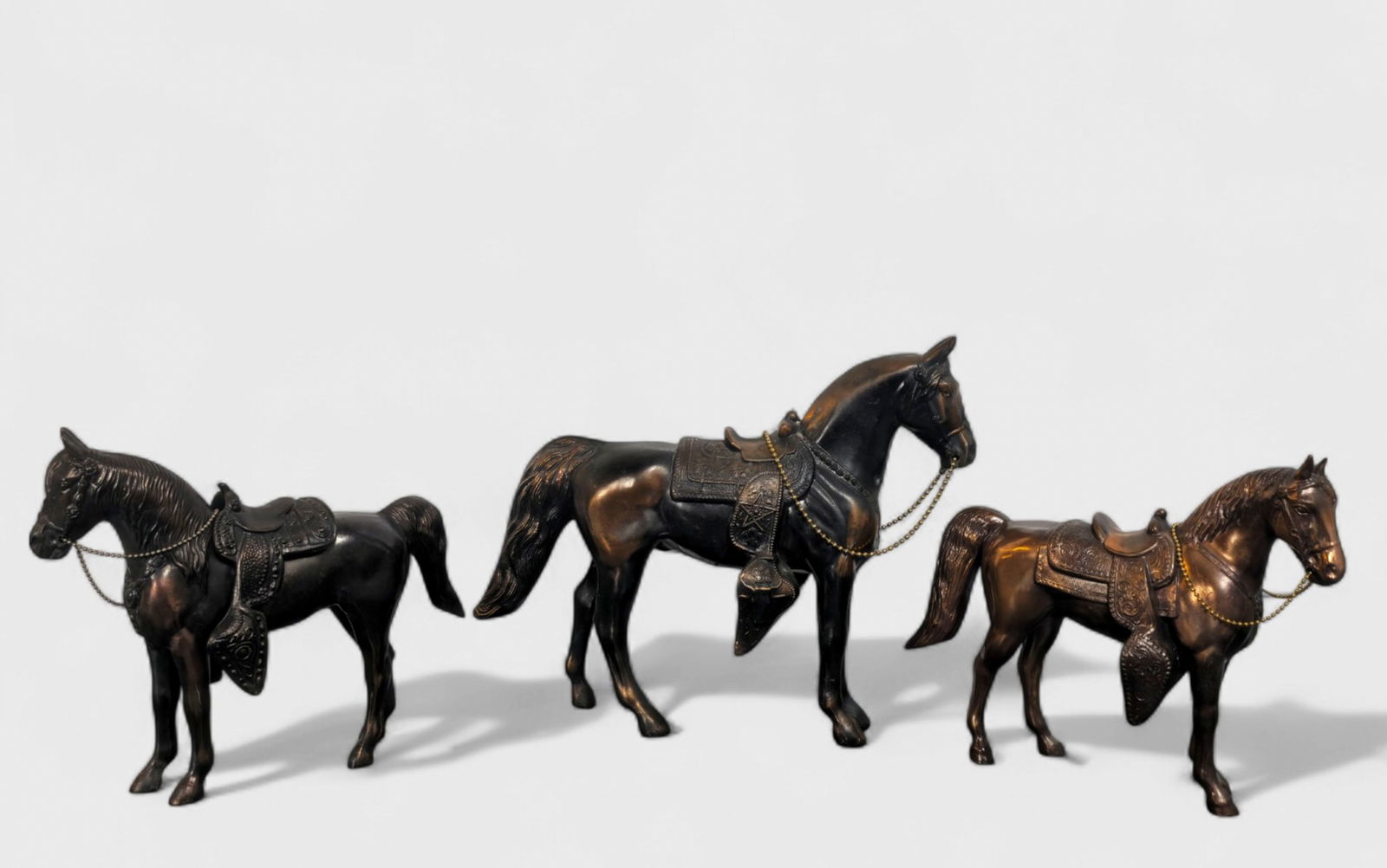 MCM Copper Patinated Horse Figures: MCM Copper Patinated Horse Figures, set of (3), USA, 1960's. Copper patina over metal. 12 1/2w x 3d x 10 1/4h