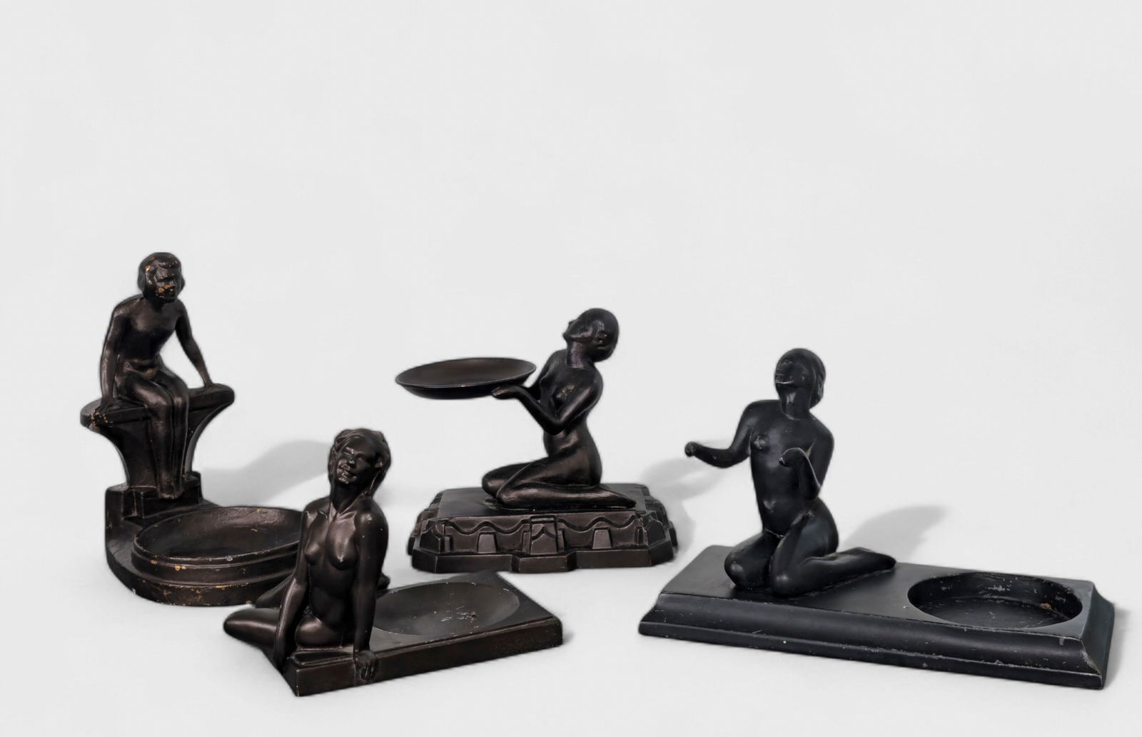 Art Deco Nude Desk Set: Art Deco Nude Desk Set, USA, 1920's, set of (4). Lady sitting, (2) ladies sitting on side and reclining lady. 6 1/2w x 4 3/4d x 6h