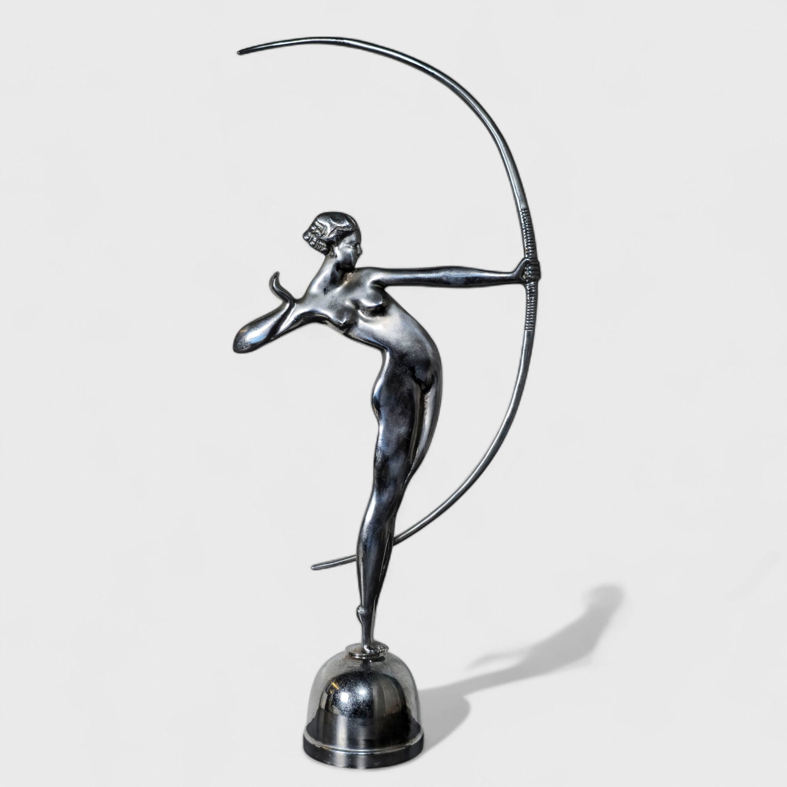 Art Deco Revival Sculpture of Diana: Art Deco Revival Sculpture of Diana, 1970's. Chrome plated metal. 10w x 3 1/2d x 20 1/2h