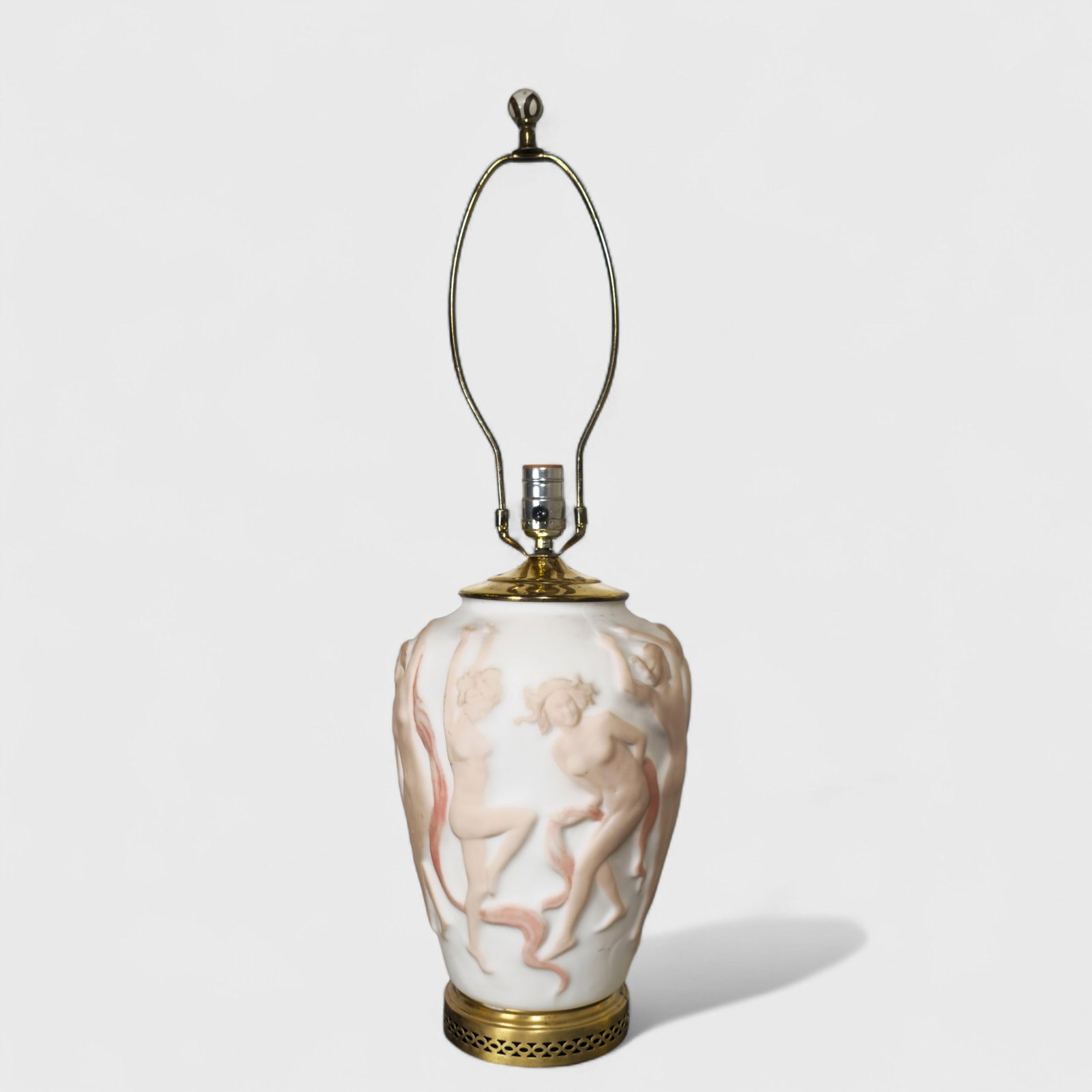 Art Deco Consolidated Phoenix Nude Table Lamp: Art Deco Consolidated Phoenix Nude Table Lamp, USA, 1930's. Opaque glass with peach colored nudes. Brass pierced base and brass cap. Vase- 14h