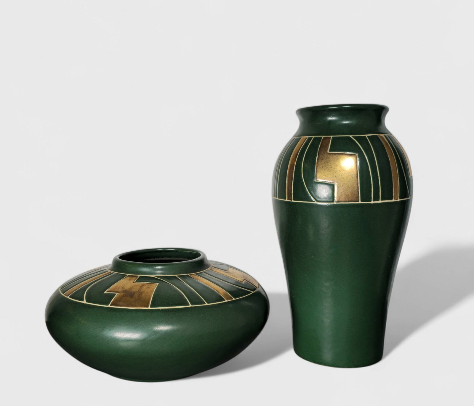 Art Deco Revival Harris Pottery with Cairo Pattern: Art Deco Revival Harris Pottery with Cairo Pattern, USA, 1980's. Manufacturer's label to underside. Art pottery with incised and applied gold glaze. 11dia x 5h Vase- 6 1/2dia x 12 3/4h