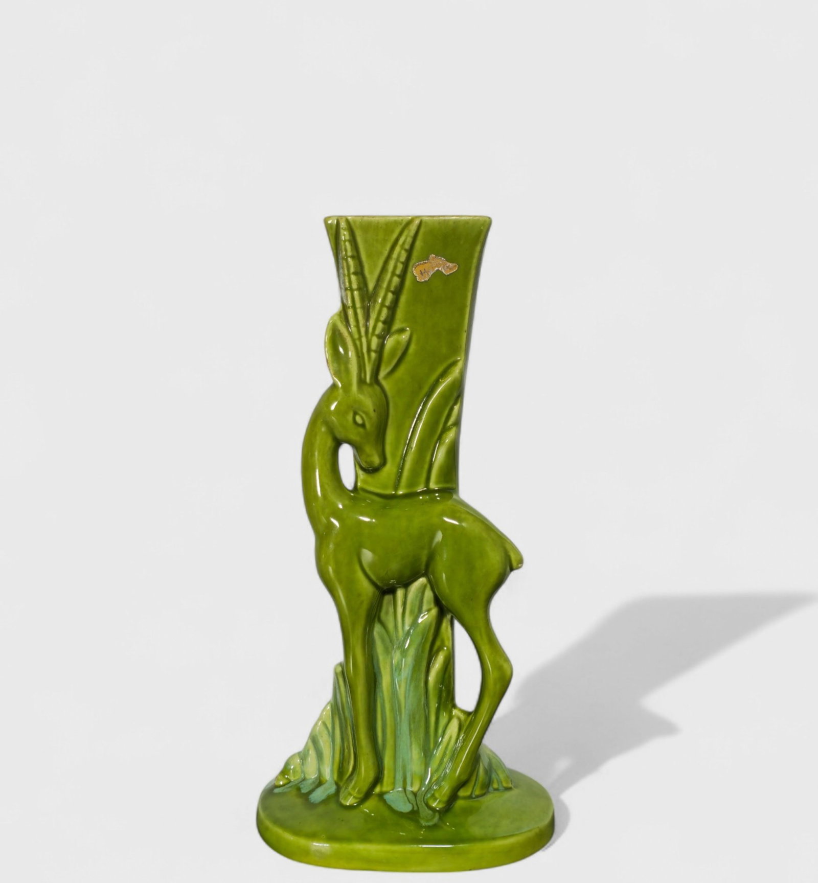 Haeger MCM Gazelle Vase, #Q707: Haeger MCM Gazelle Vase, #Q707, USA, 1950's. Manufacturer's label. Glazed pottery. 7w x 4 1/2d x 14 1/4h