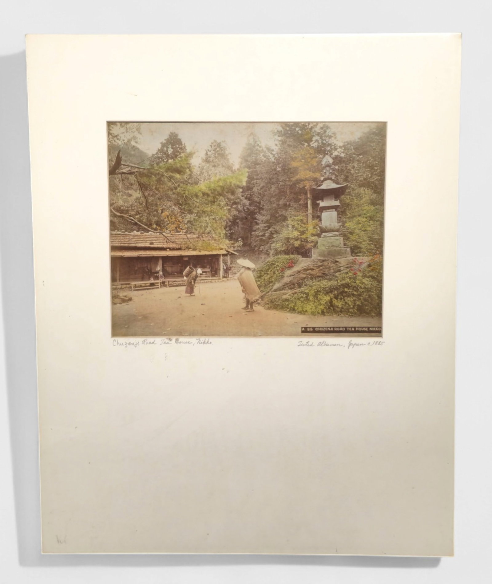 Unknown 19th Century Photograph, Chu Zenji Road Tea House, Nikko: Unknown 19th Century Photograph, Chu Zenji Road Tea House, Nikko, dated 1885. #A 515, tinted albumen, Japan 1885 lower margin. Image size- 8 1/4 x 10 3/8